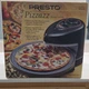 Presto Pizzazz 03430 Pizza Oven, 1235W, Black, Rotating Tray, Nonstick Pan.